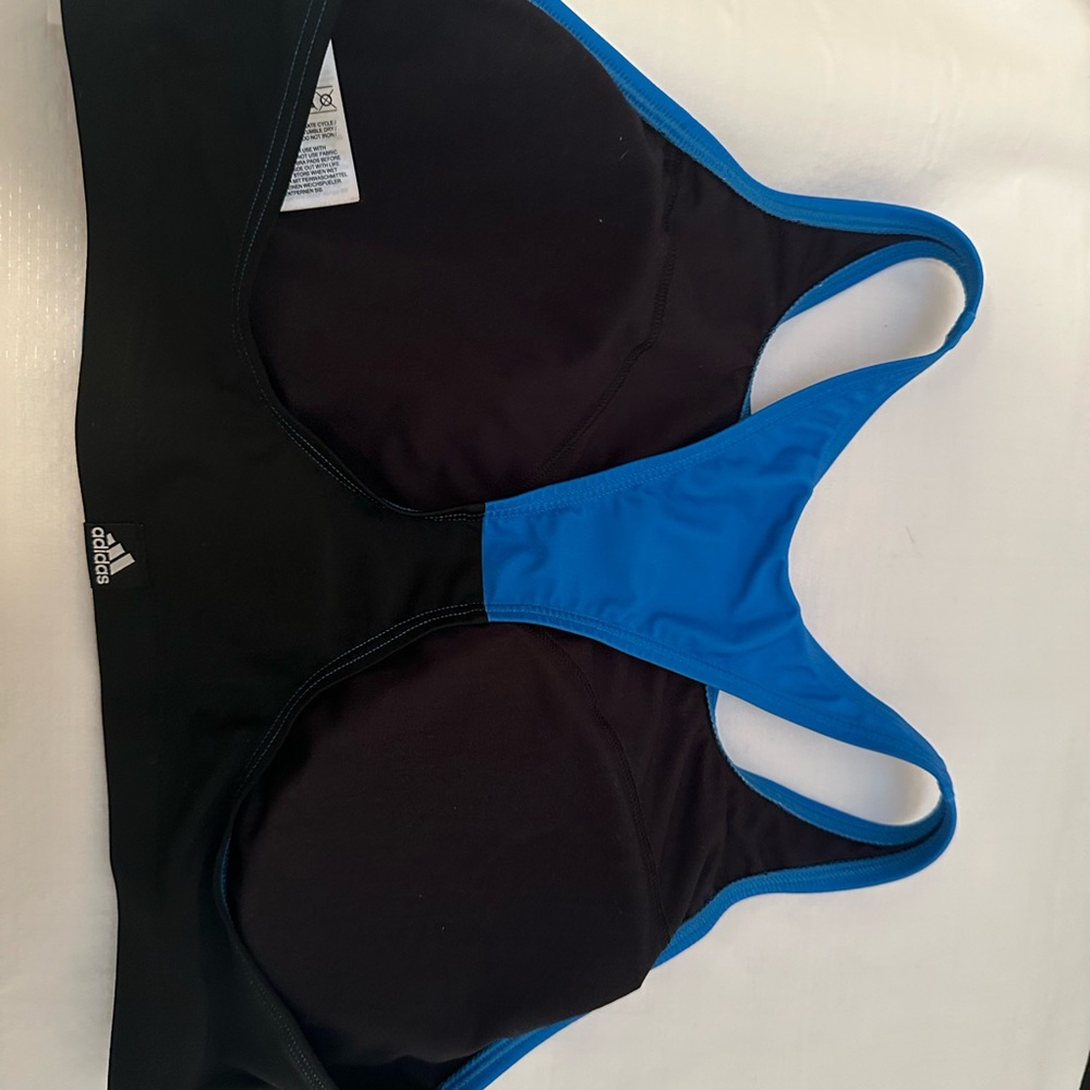 Adidas bathing suit top Size L. Never worn.